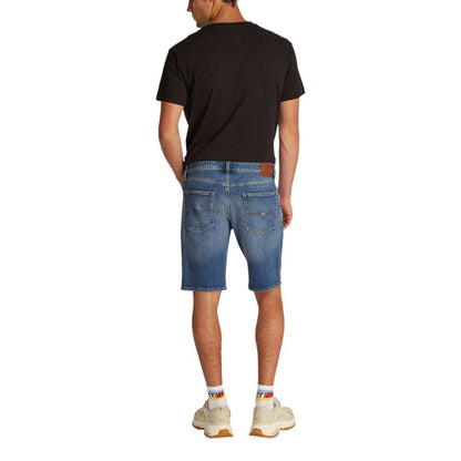 Back view of a man wearing Tommy Hilfiger Jeans Blue Recycled Cotton Bermuda Shorts, showcasing fit and style.