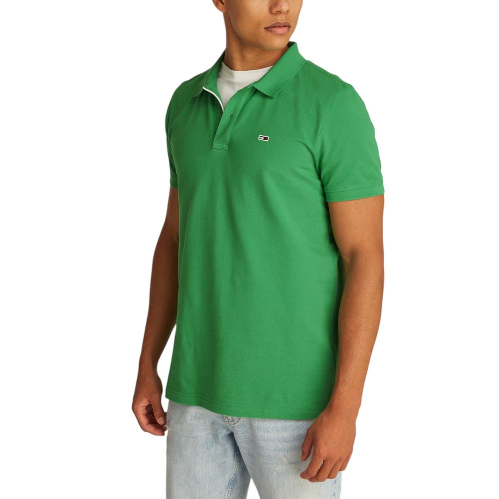 Tommy Hilfiger Jeans Green Cotton Polo Shirt with embroidered logo on chest, worn by model with light jeans.