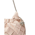 Pale pink Tory Burch Fleming mini leather hobo bag with quilted design, chain-link shoulder strap, and detachable charm.