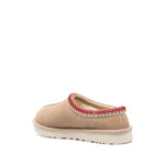 UGG Australia Sandals Beige with tobacco brown calf suede and vulcanised-rubber sole, featuring embroidered edge and fleece lining, side view.