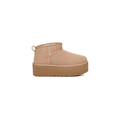 UGG Beige Suede Leather Ankle Boots with platform sole and minimalist design for comfort and style, ideal for cooler days and versatile outfits.