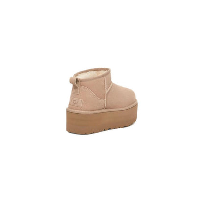 UGG Beige Suede Leather Ankle Boots with platform sole, rear view showcasing cozy suede and minimalist design.
