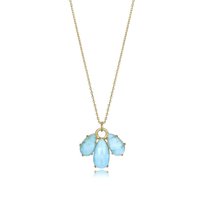 Elegant gold necklace with blue gemstones on a delicate chain