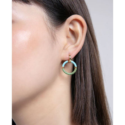 Close-up of model wearing VICEROY JEWELS Mod. 13199E100-99 earrings, mineral dial, silver 925°, quartz analog, 10 ATM water resistance.