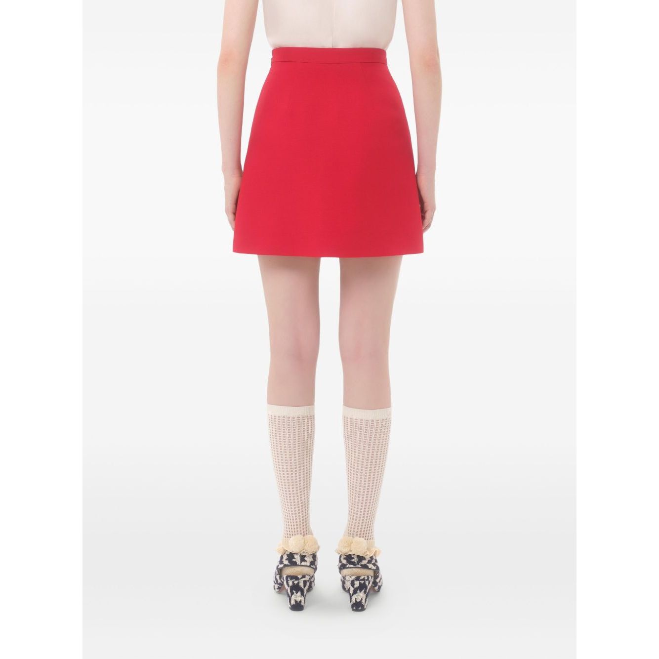 Back view of Valentino Crepe Couture Skirt in red with heart motif and concealed zip fastening.