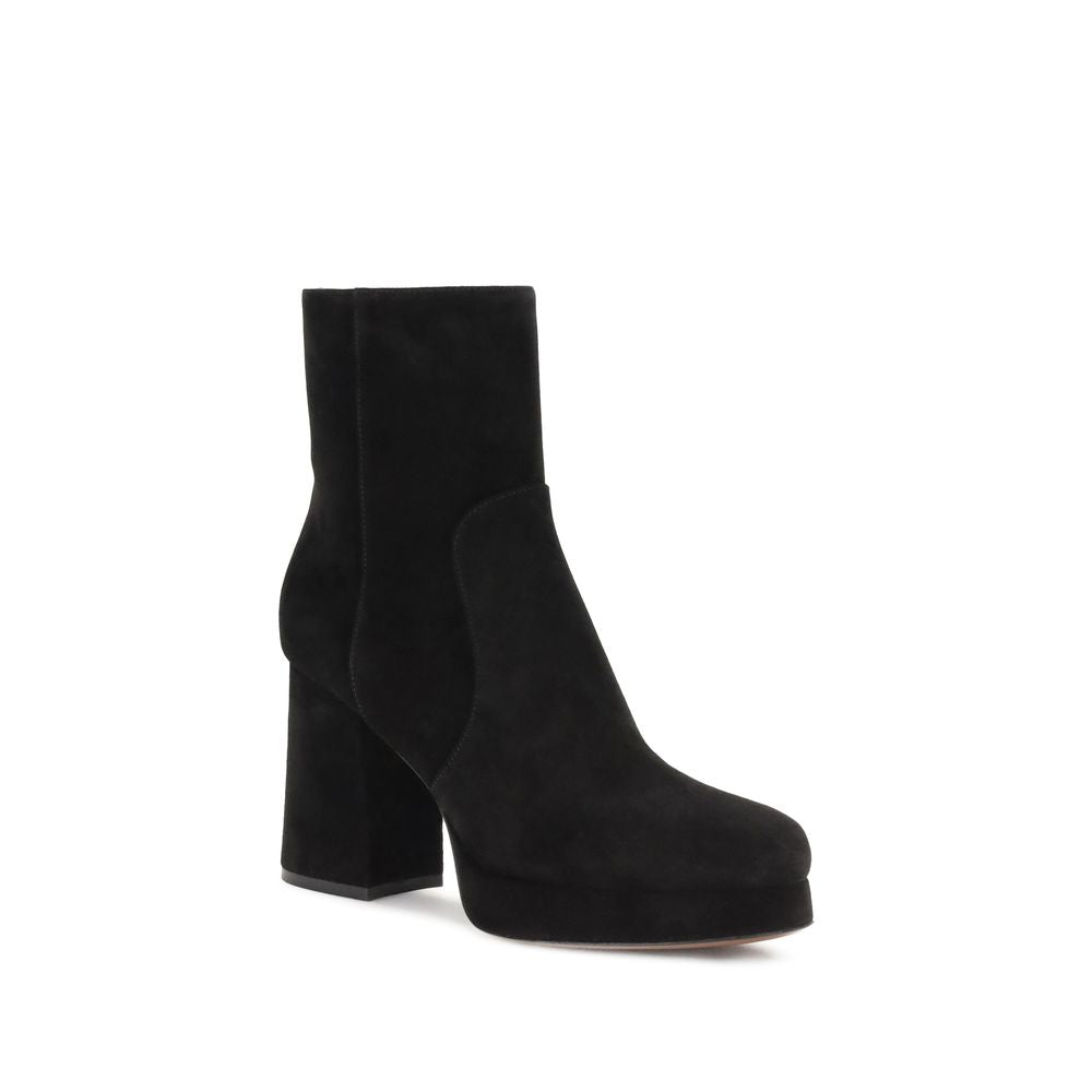 Valentino Garavani Black Calf Leather Bos Taurus Ankle Boots with wide heel and platform, featuring VLogo detail and side zipper closure.