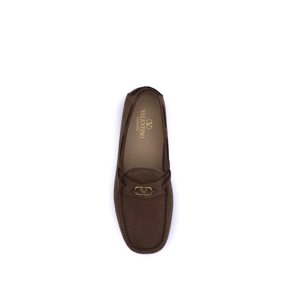 Top view of Valentino Garavani Brown Rubber Slip-On Loafers with VLogo plaque and notched sole for grip.