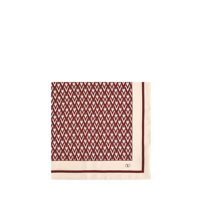 Valentino Garavani Red Silk Scarf with Toute la V print and VLogo corner embellishment, elegant fashion accessory for versatile styling.