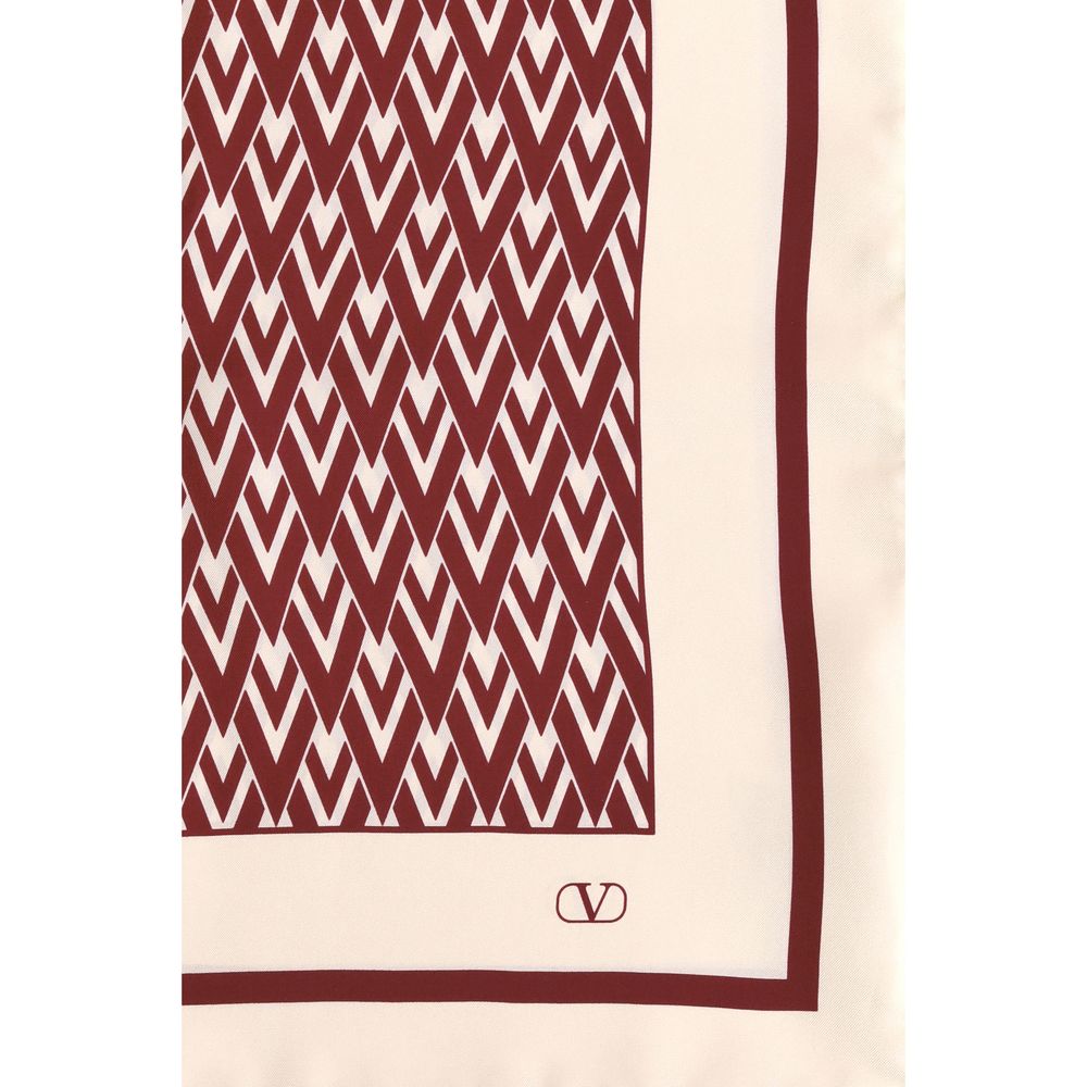 Valentino Garavani Red Silk Scarf with Toute la V print and VLogo, elegant and stylish accessory for neck, hair, or bag.