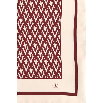 Valentino Garavani Red Silk Scarf with Toute la V print and VLogo, elegant and stylish accessory for neck, hair, or bag.
