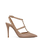 Valentino Garavani Rockstud Décolleté With 100mm Straps in powder pink leather, featuring gold-tone Rockstud detailing and pointed toe.