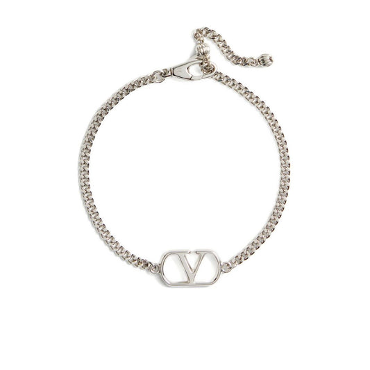 Valentino Garavani VLogo Signature bracelet with silver chain and logo plaque, adjustable clasp.