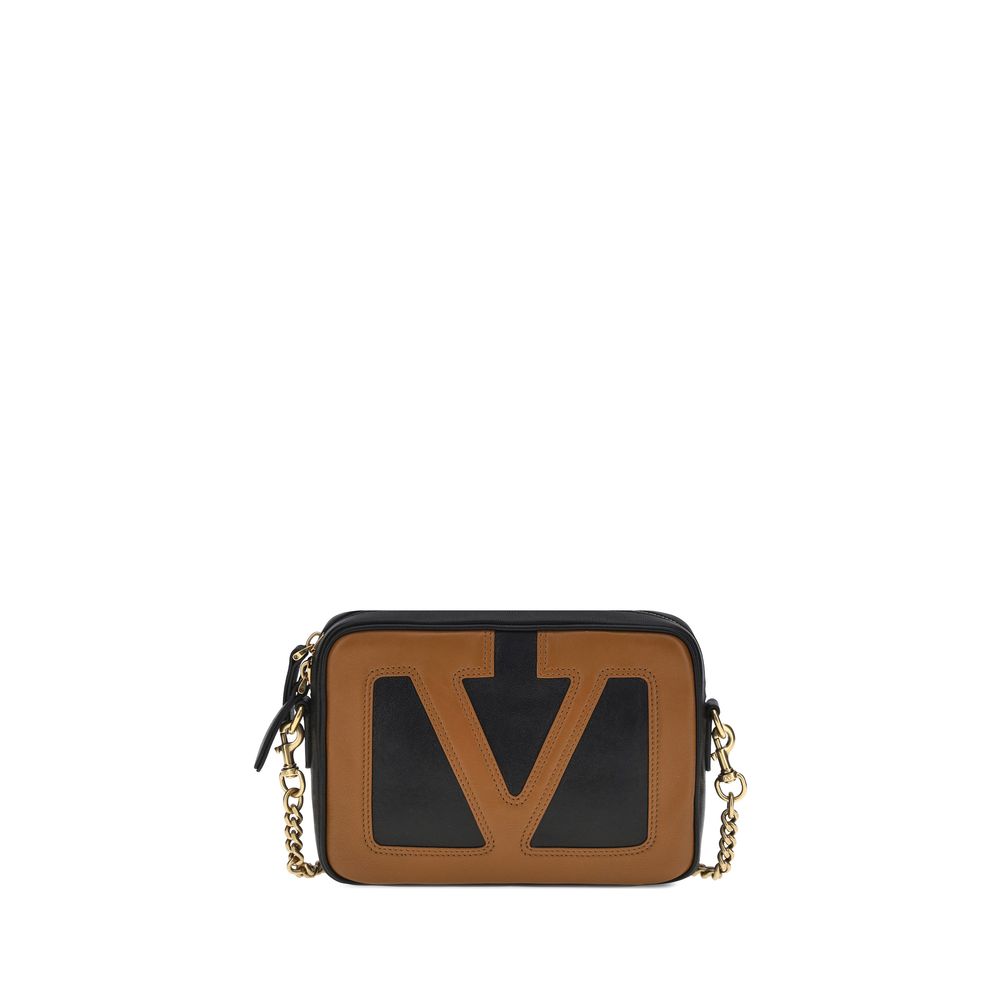 Front view with bag zipped and handles upright.