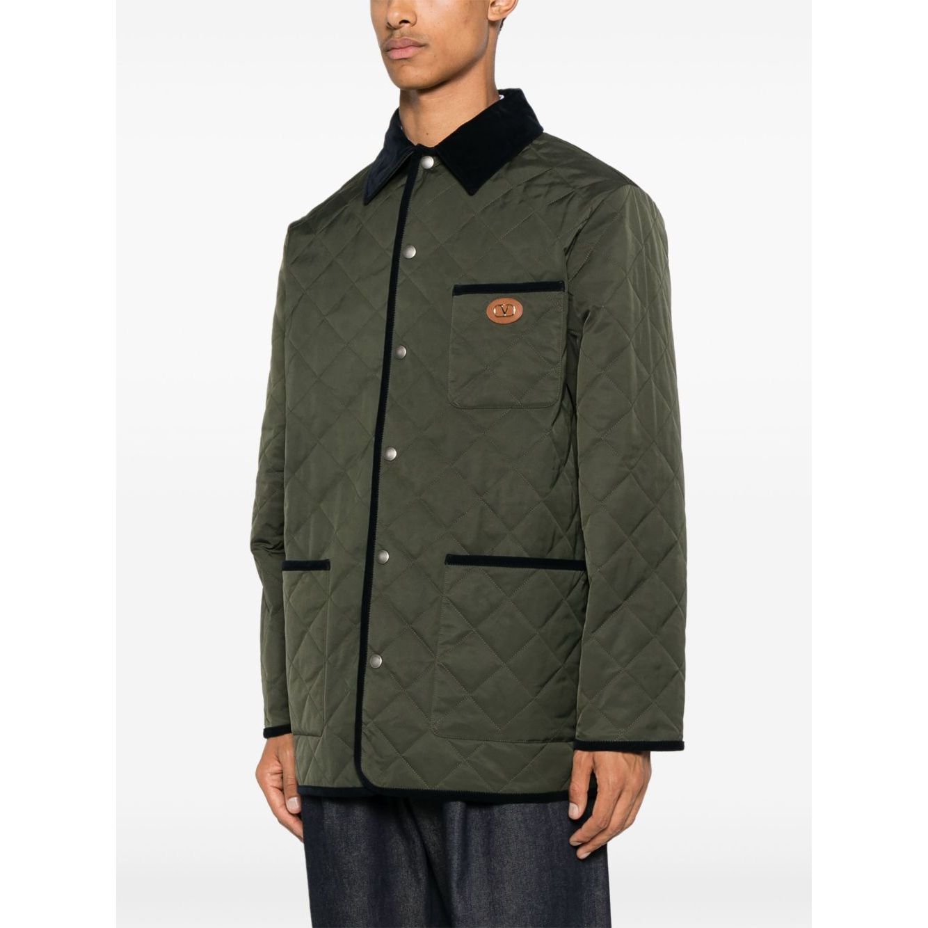 Valentino Vlogo Signature quilted jacket in olive green with contrasting collar, patch pockets, and press-stud fastening front view.
