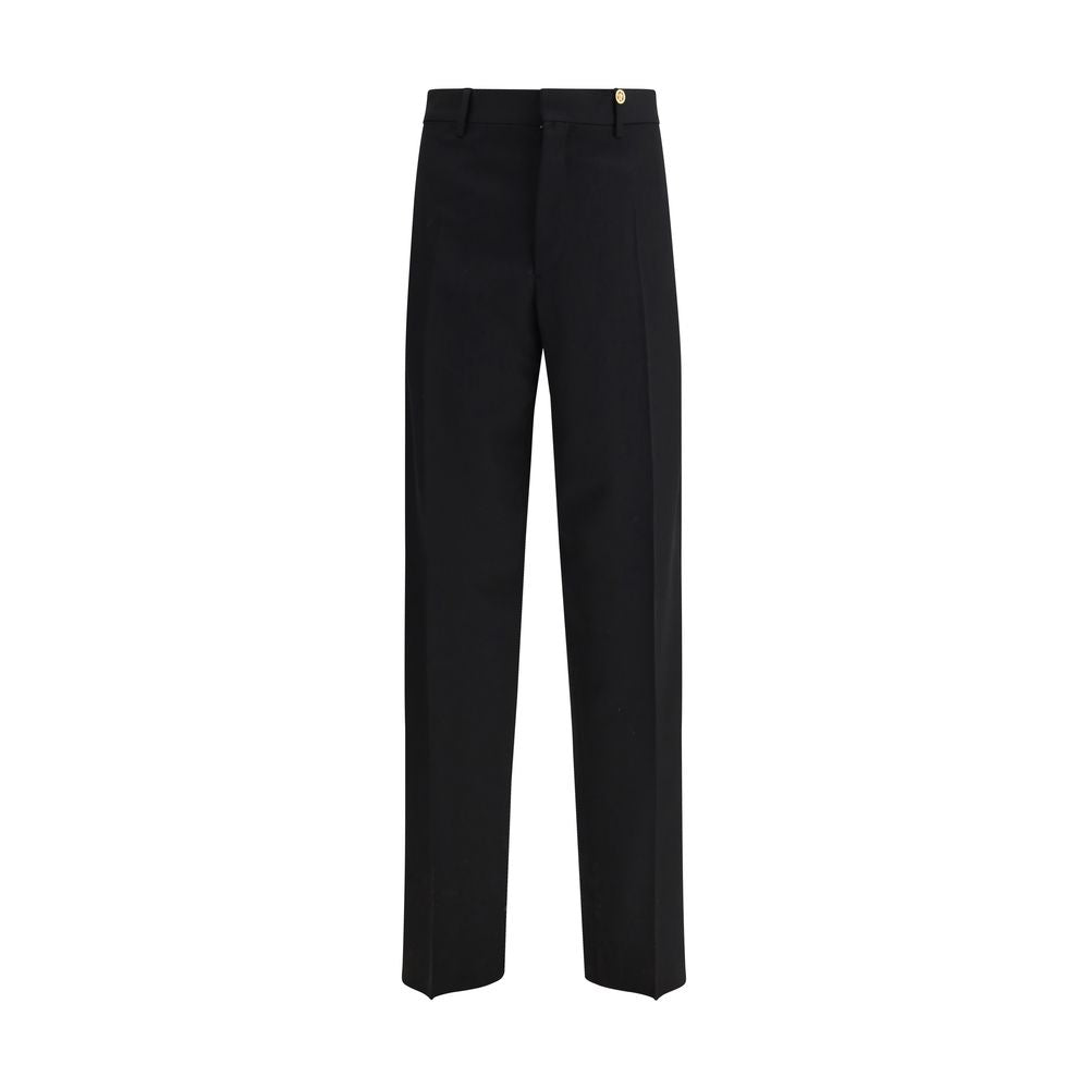 Versace Black Fleece Wool Dress Pants with slim fit and jacquard label, featuring side and back welt pockets.