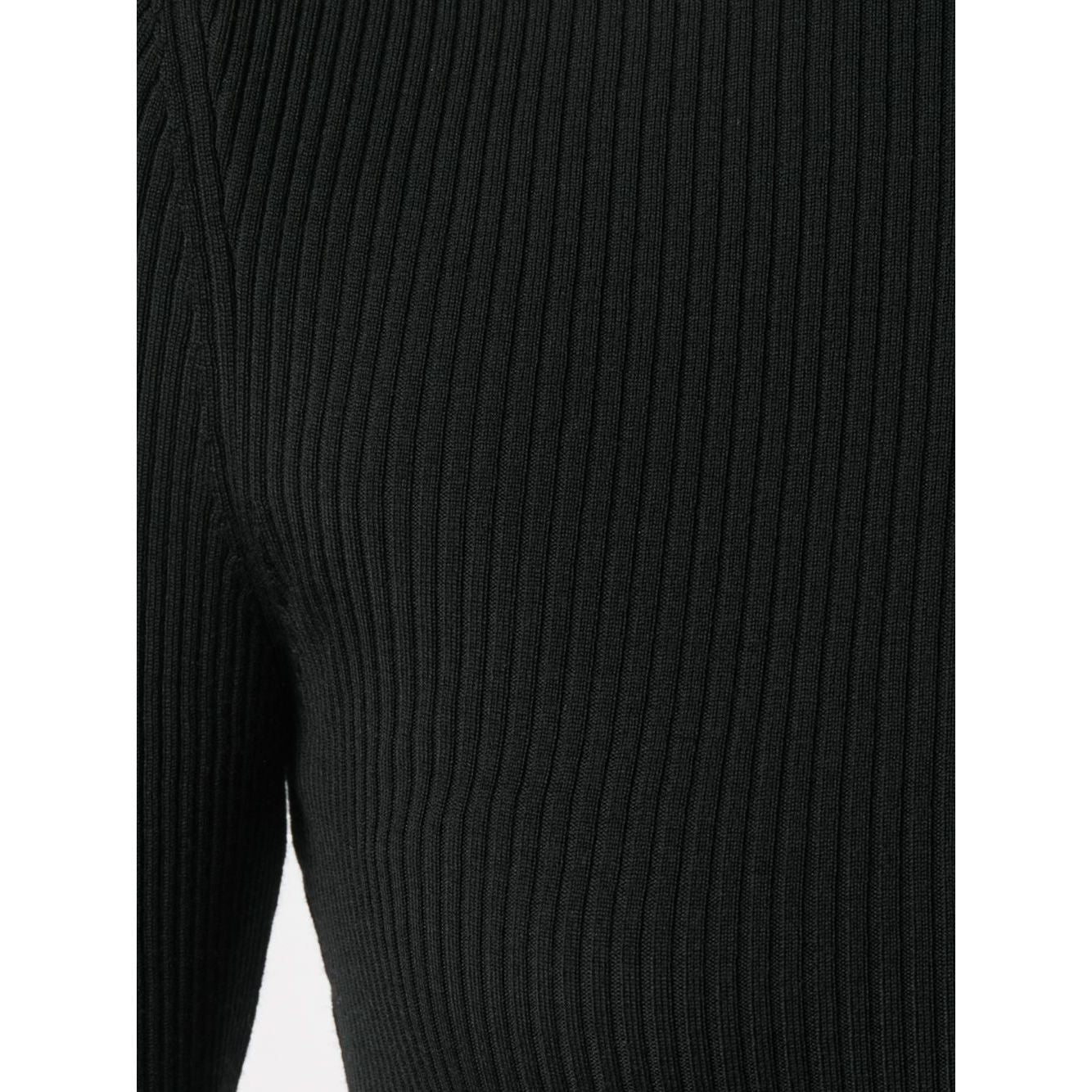 Close-up of ribbed knit fabric on Wolford Sweaters Black, showcasing the fitted silhouette and roll neck design.