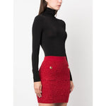Woman wearing Wolford Top Black stretch roll neck bodysuit with red textured skirt, showcasing long sleeves and slim fit design.