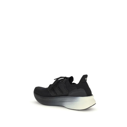 Y-3 Black Fabric Athletic Sneakers with canvas upper and Y-3 logo on tongue, showcasing a stylish and comfortable design.