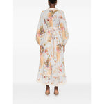 Back view of Zimmermann Ascension Ruffled Midi Dress in light blue with floral print and lace trim, featuring a self-tie wrap design.