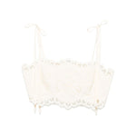 Zimmermann Cropped top with beige tie-fastening straps, cut-out floral detail, lettuce hem, and Rhiannon embroidered bodice.